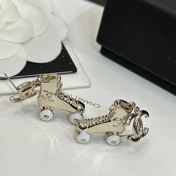 18K Chanel Skate Shoe Pendant Earrings