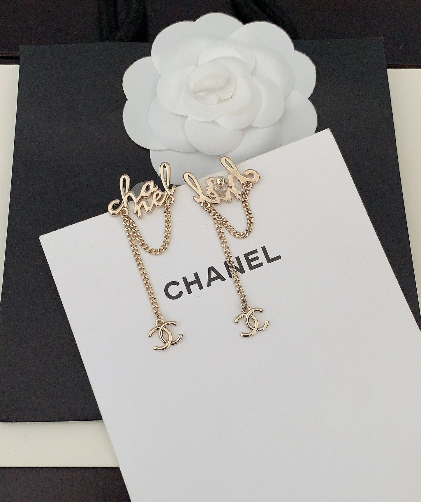18K Chanel Letter Earrings