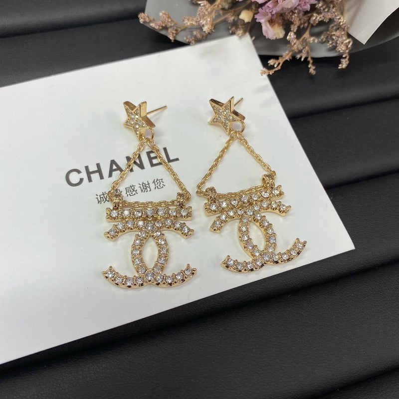 18K Chanel Star Earrings