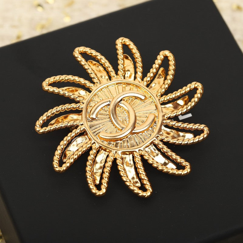 18K Chanel Sunflower Brooch