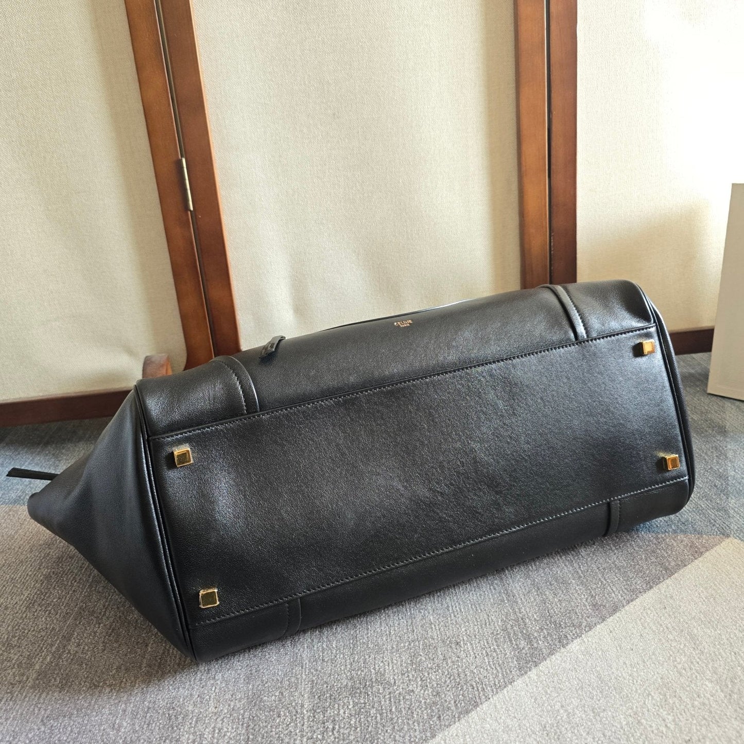 CELINE 25S MEDIUM SMILING NEW LUGGAGE 44MM IN BLACK SUPPLE SHINY LAMBSKIN