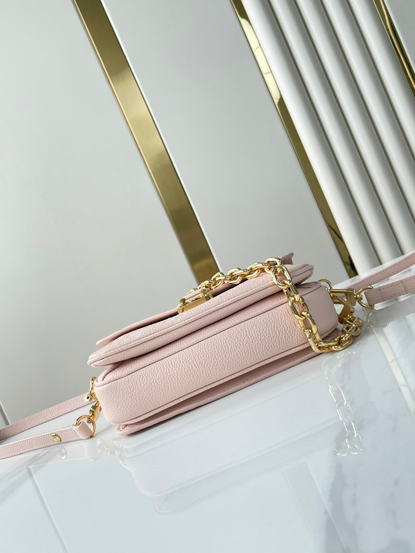 LOUIS VUITTON POCHETTE MÉTIS EAST WEST 21 IN PINK OPALE MONOGRAM ECLIPSE CANVAS GOLD BUCKLE