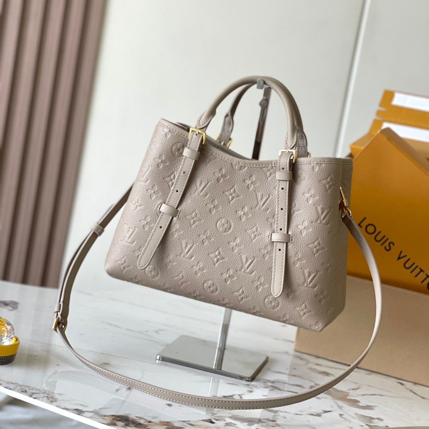 LOUIS VUITTON BABYLONE TOTE 31 IN TOURTERELLE MONOGRAM EMPREINTE LEATHER